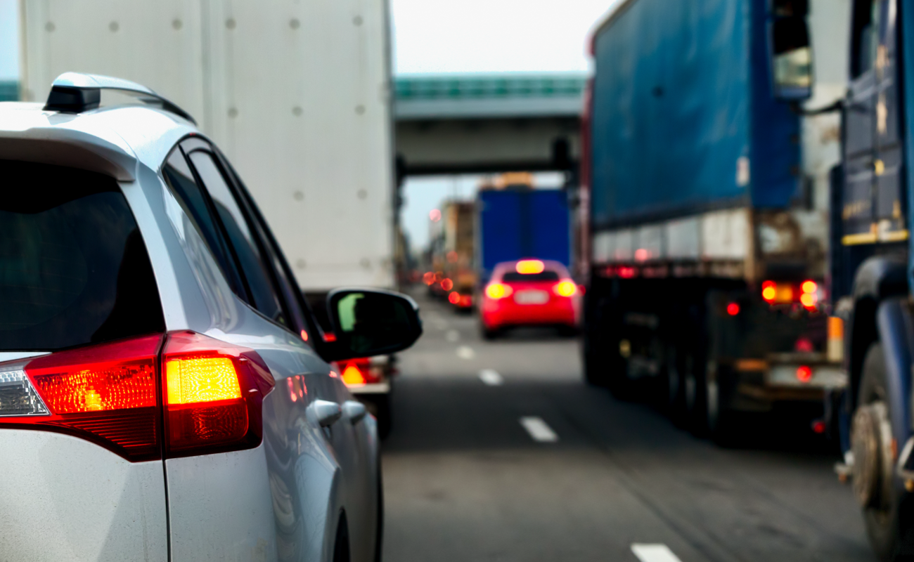 Traffic Photo of Cars and Semi-Trucks