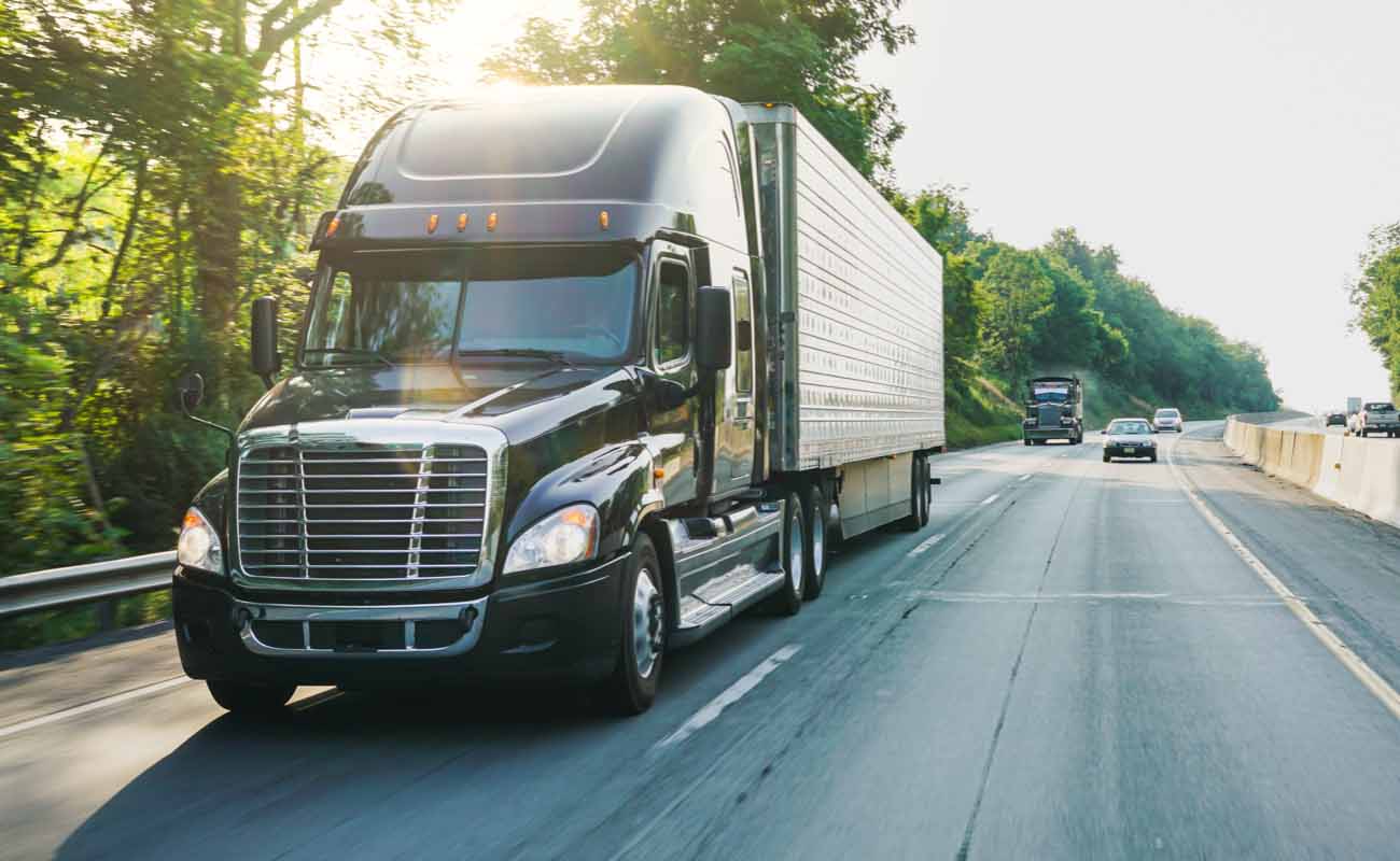 Semi-Truck Driving on Highway Semi-Truck Driving on Highway